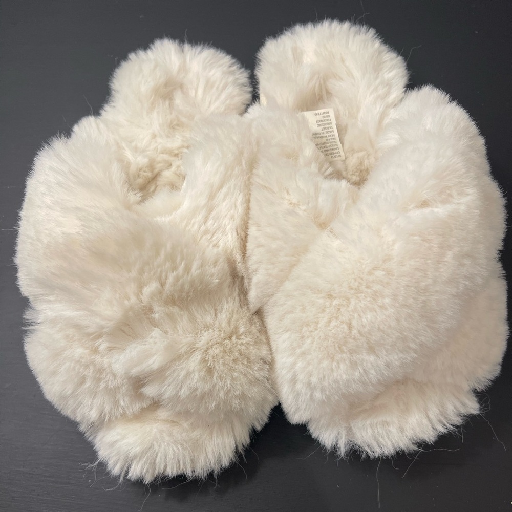 Slippers cream color size 13/1 kids size.